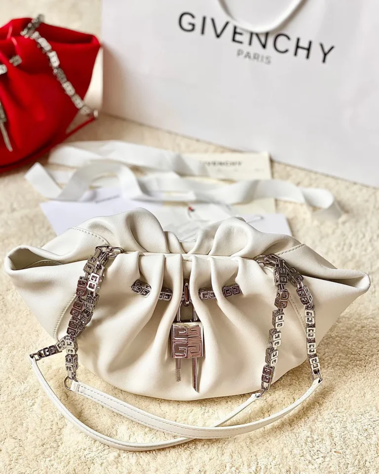 Ivory Ruched Chain Pouch — front styled