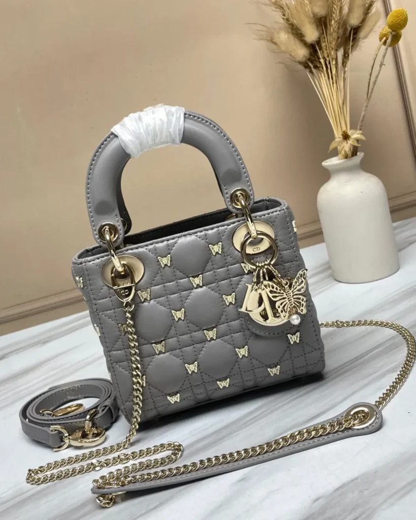 Gray Butterfly Stud Quilted Top Handle Bag — front view