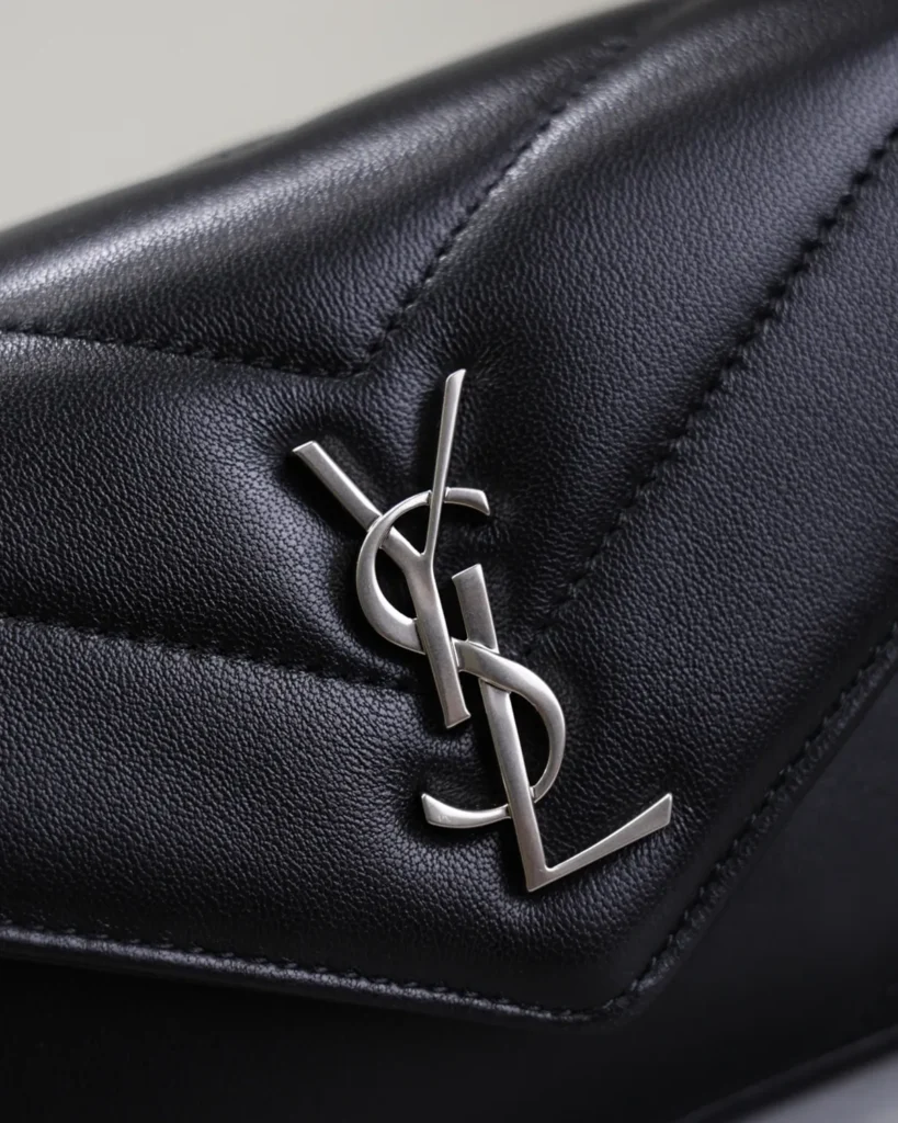 Black Chevron Flap Bag with Silver-Tone Chain — logo detail view