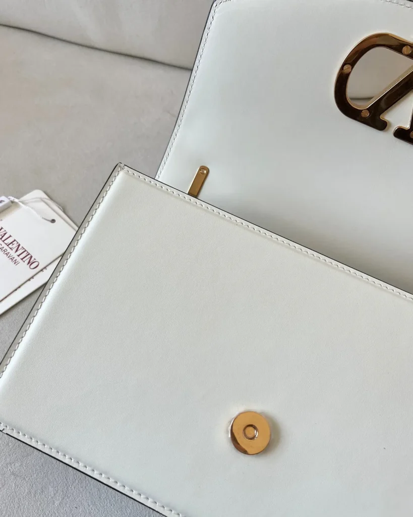 Ivory Curved-Flap Chain Shoulder Bag — open flap view
