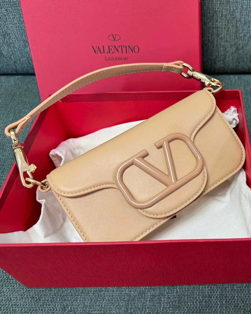 Beige Tonal-Ornament Flap Shoulder Bag — angled front view