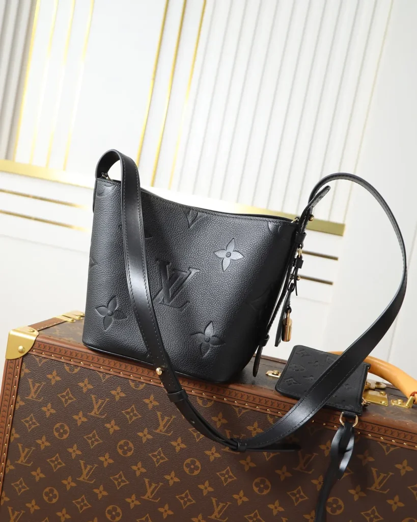 Black Embossed Monogram Bucket Bag — rear view
