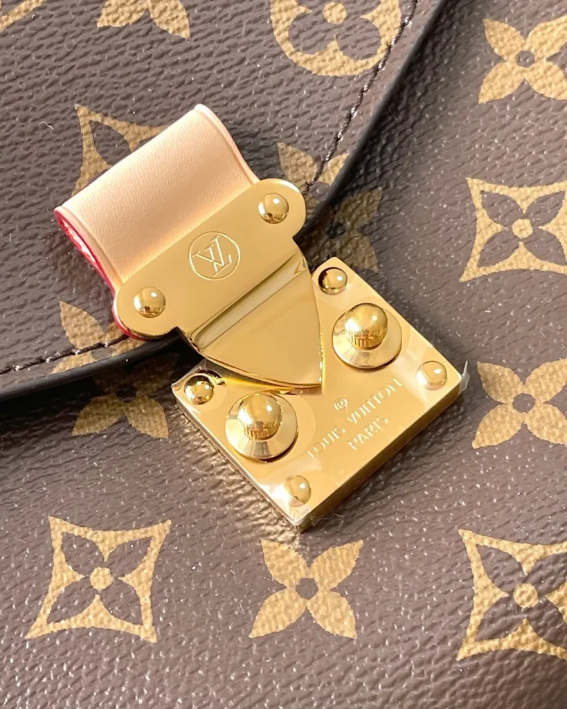 Brown Monogram Flap Satchel — clasp view