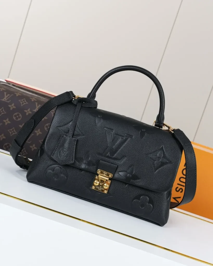 Black Embossed Flap Top Handle Bag — front view