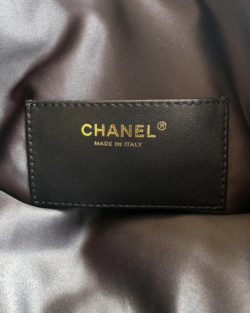 Dark Navy Quilted Chain Drawstring Tote — interior label view