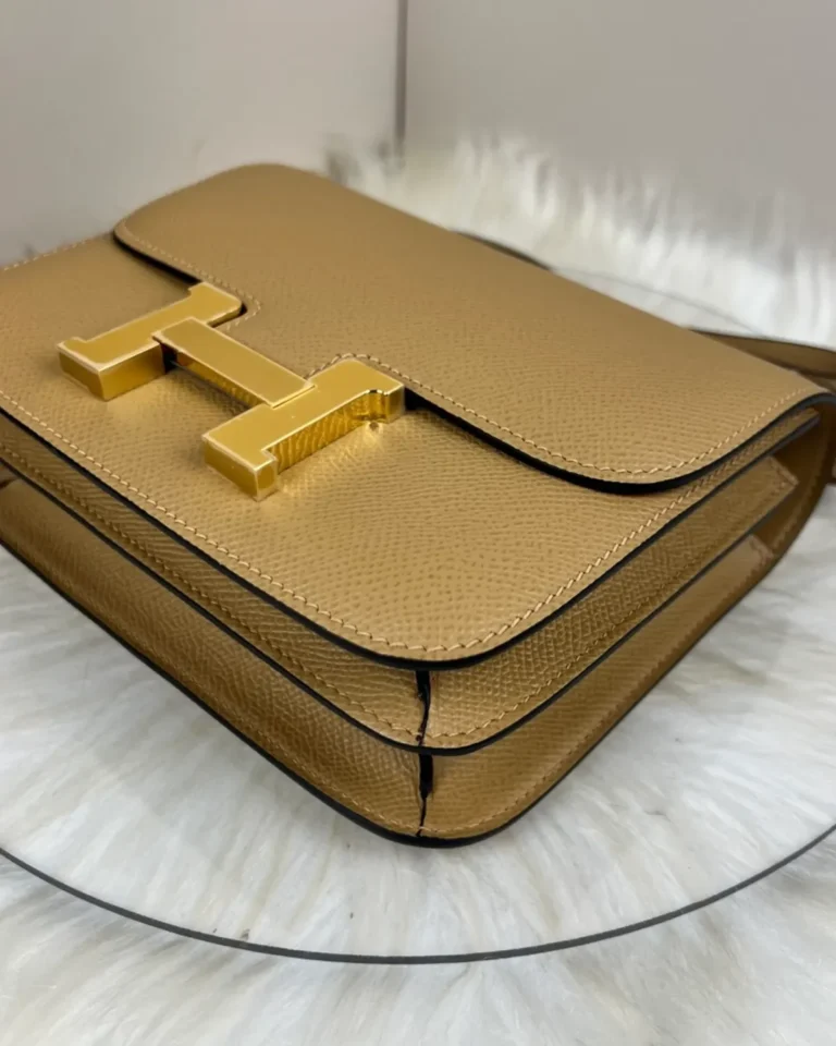 Kraft Tan constance-inspired mini 18 bag, clasp detail view