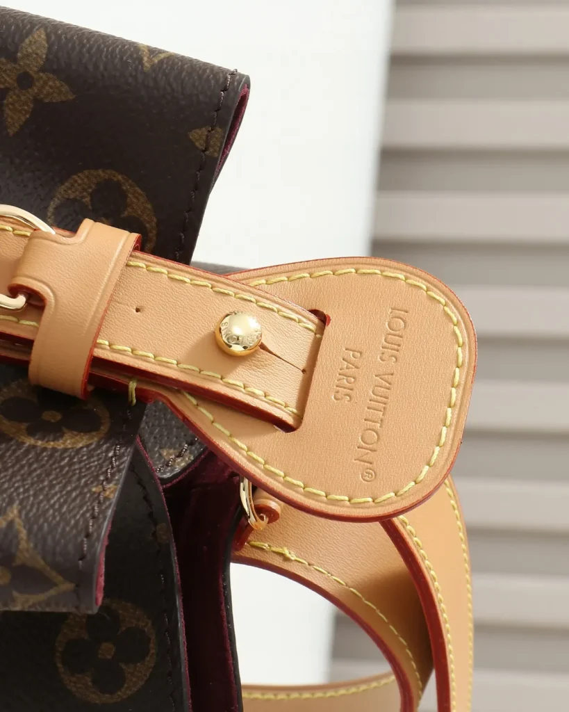 Brown Monogram Curved Top Bucket Bag — handle tab view
