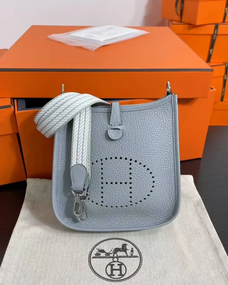 Evelyne-Inspired Mini Flax Blue Crossbody Bag, front beside folded strap
