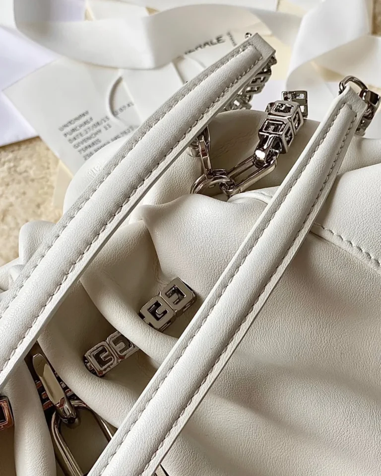 Ivory Ruched Chain Pouch — upper edge