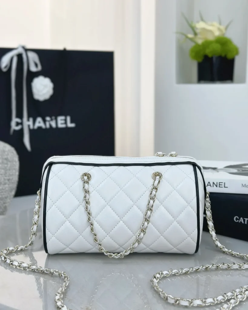 White and Black Quilted Chain Bowler Bag — rear view