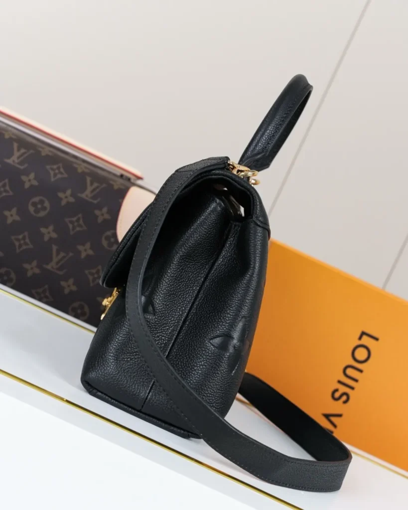 Black Embossed Flap Top Handle Bag — side view