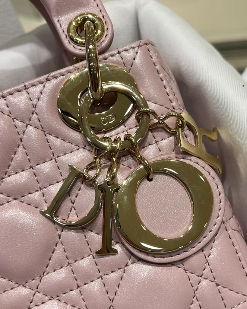 Pearlescent Pink Quilted Top Handle Bag — charms view