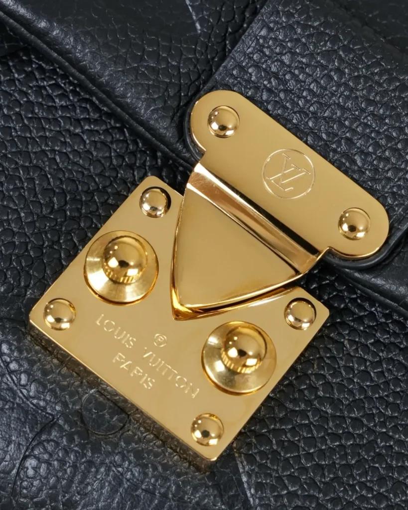 Black Embossed Flap Top Handle Bag — clasp view