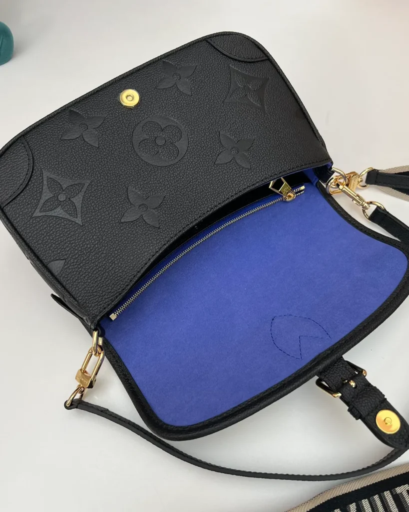 Black Embossed-Monogram Buckle Satchel — open flap view