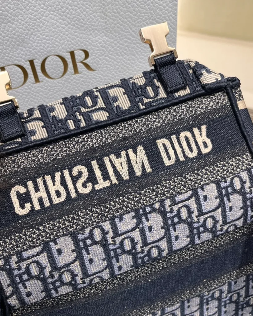 Navy Monogram Twin-Clasp Messenger Bag — interior detail view