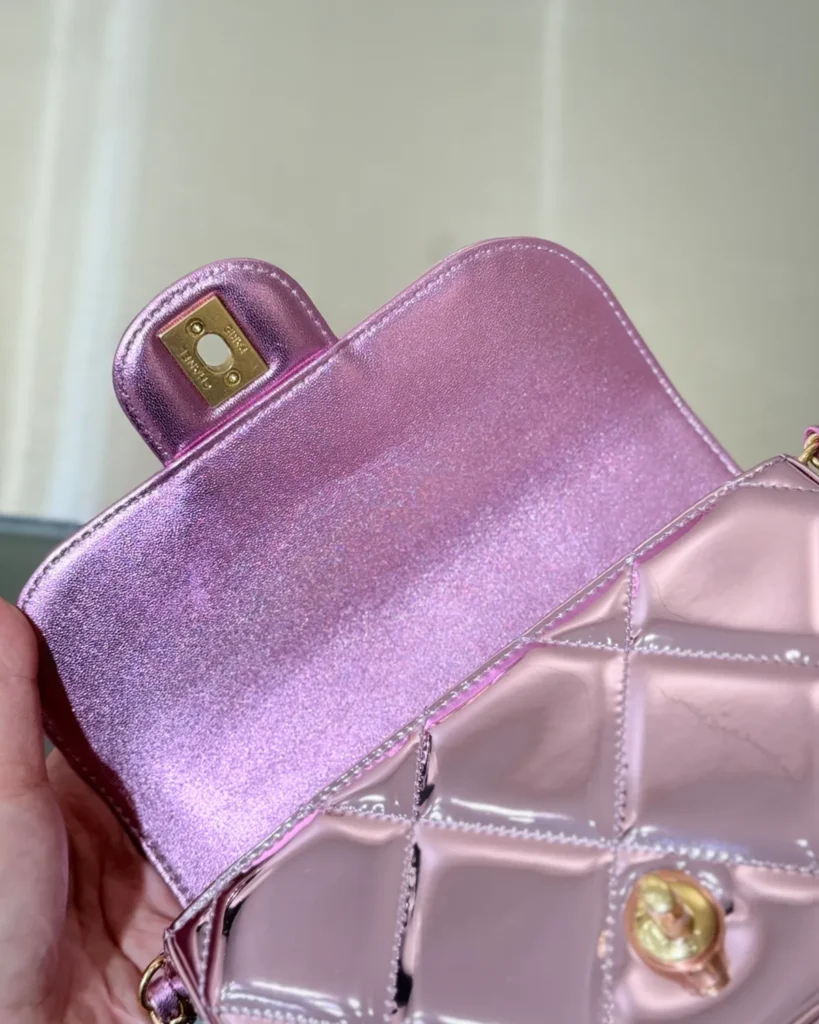 Metallic Pink Quilted Top-Handle Bag — inner flap view