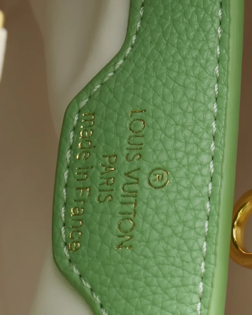 Green Cream-Accent Charm-Chain Bag — interior lettering view