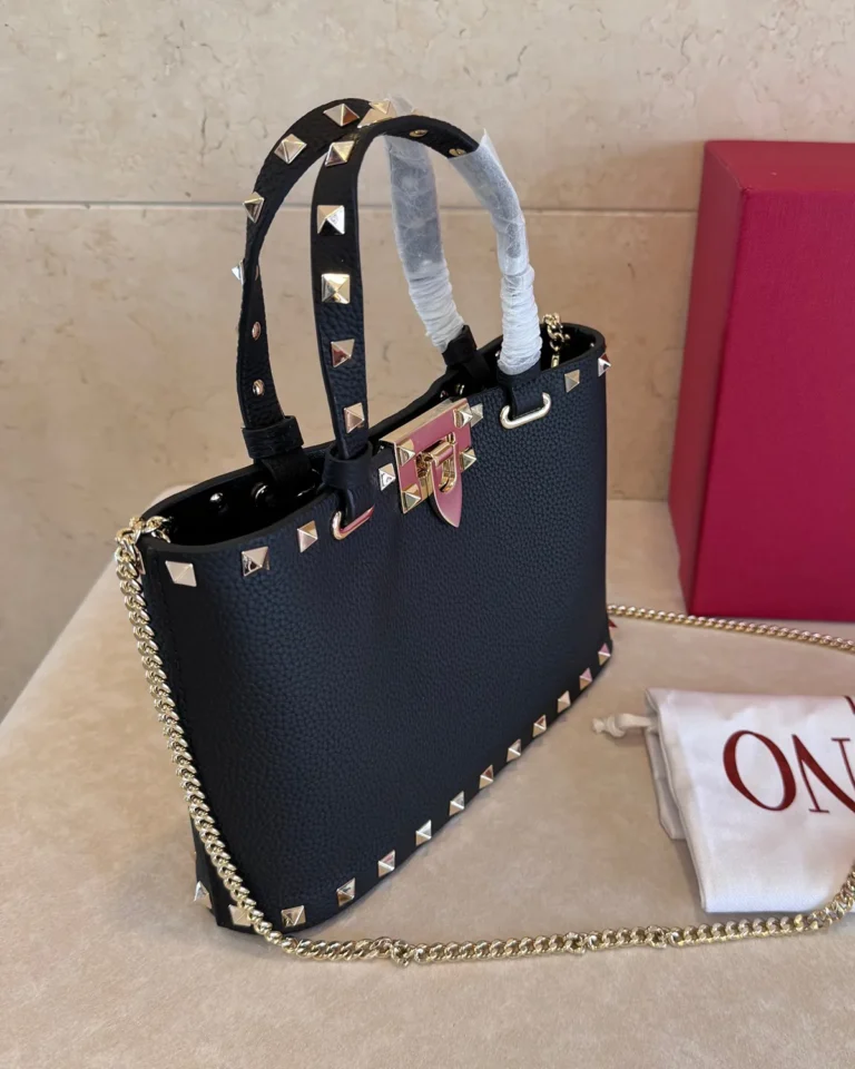 Black Studded Border Top-Handle Tote — angled front view