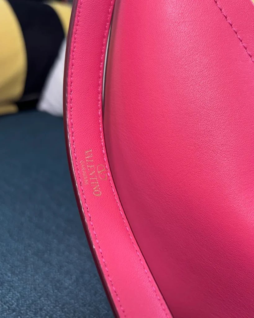 Bright Pink Crescent Chain Shoulder Bag — strap detail view