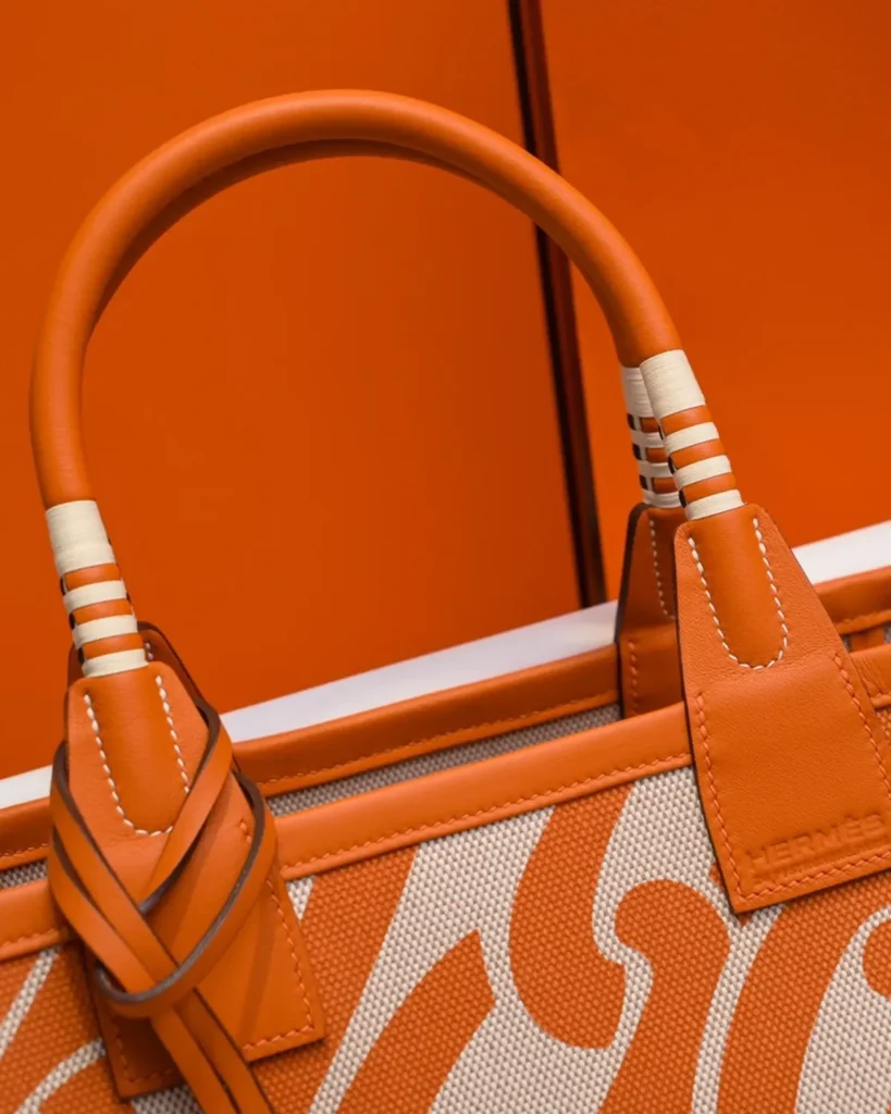 Steeple-Inspired Orange Patterned Canvas Tote, handle detail view