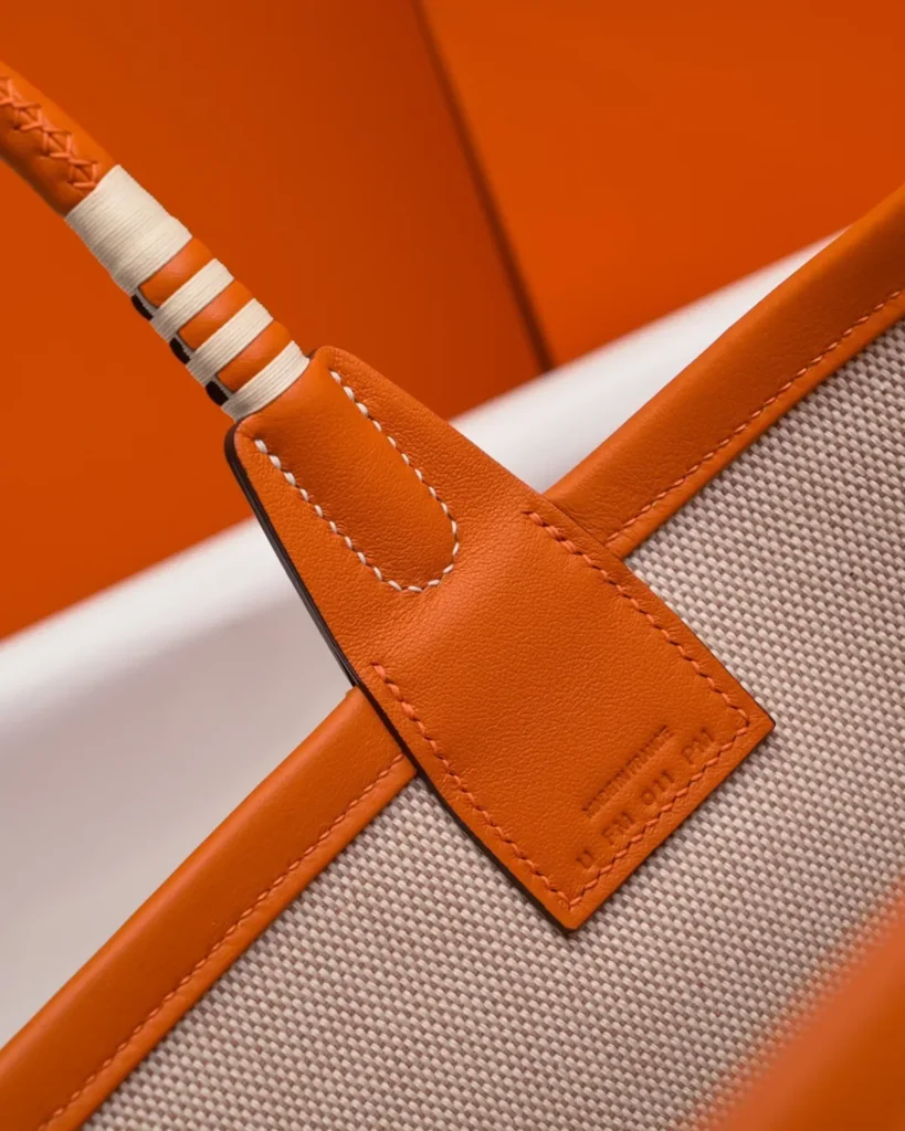 Steeple-Inspired Orange Patterned Canvas Tote, handle base view
