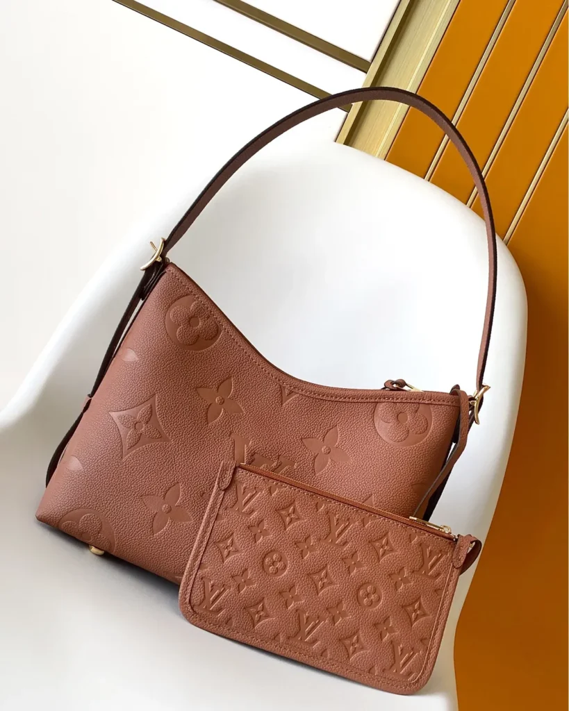 Cognac Embossed Monogram Shoulder Bag — front view