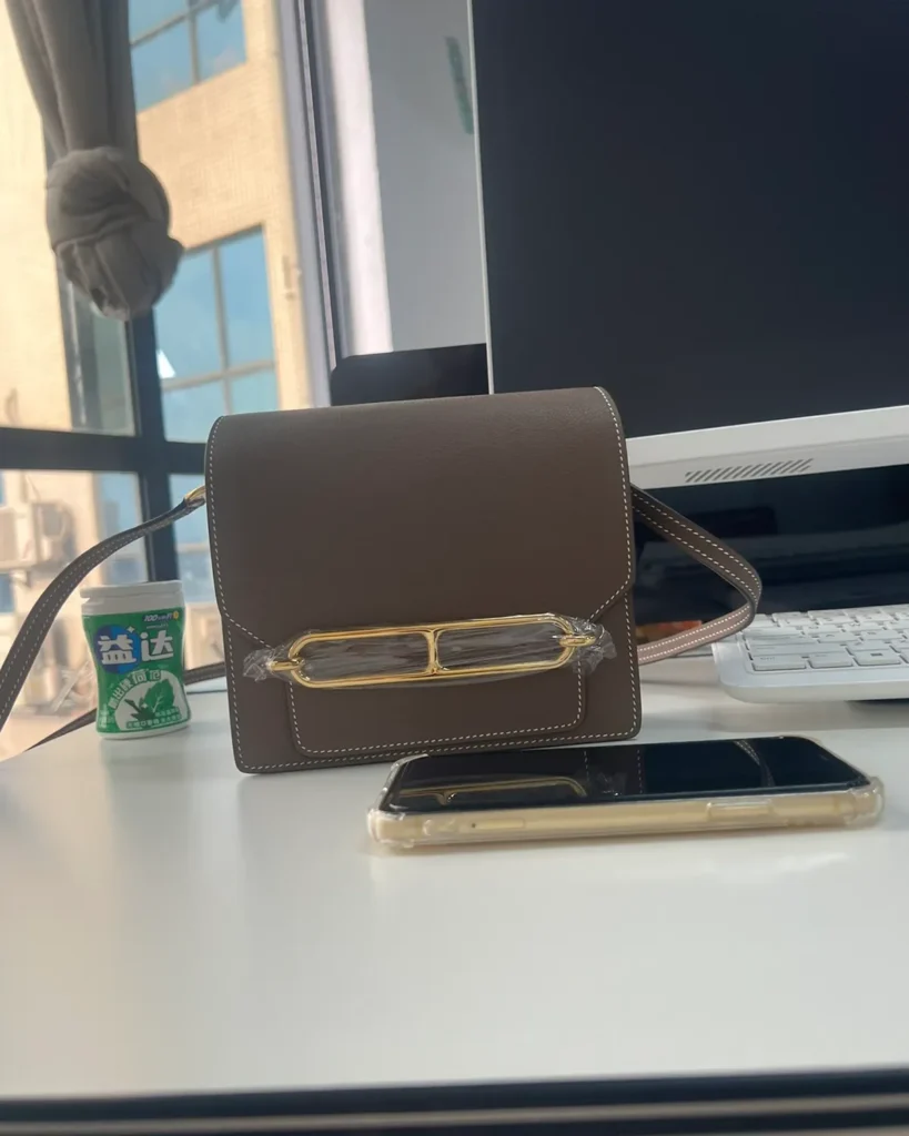 Taupe Link-Clasp Shoulder Bag — front context view