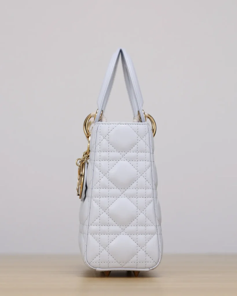 Pale Gray Quilted Top Handle Bag — side view