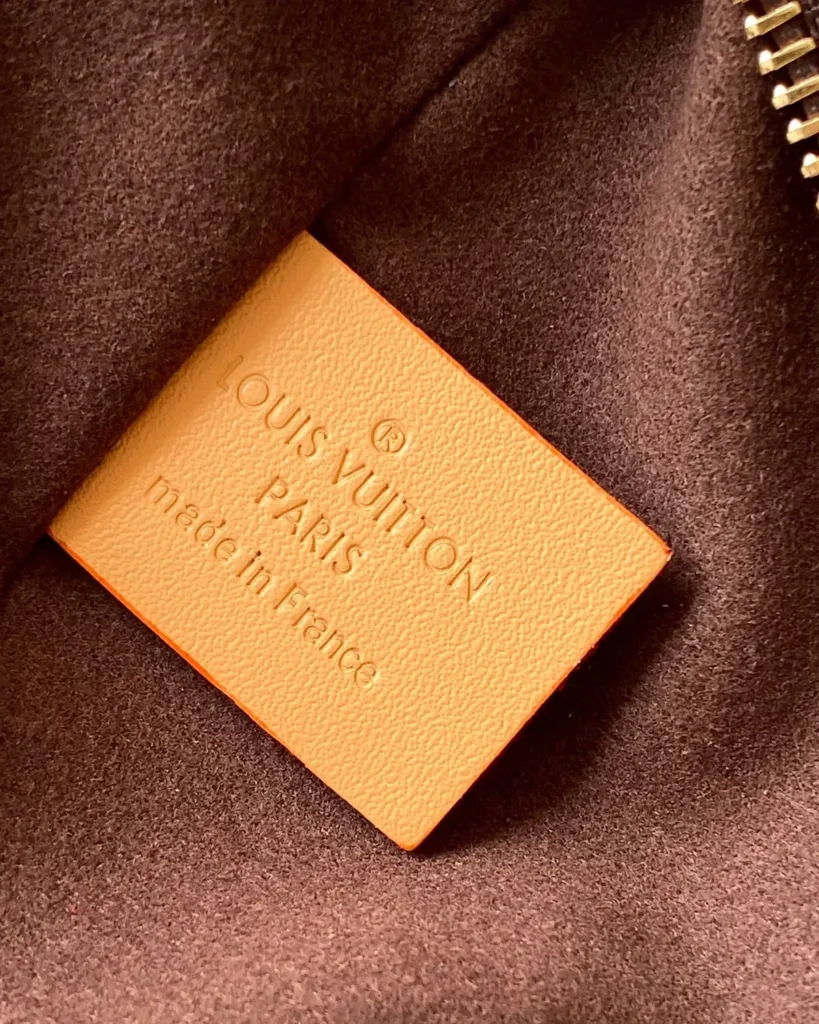 Brown Monogram Crescent Shoulder Bag — interior label view