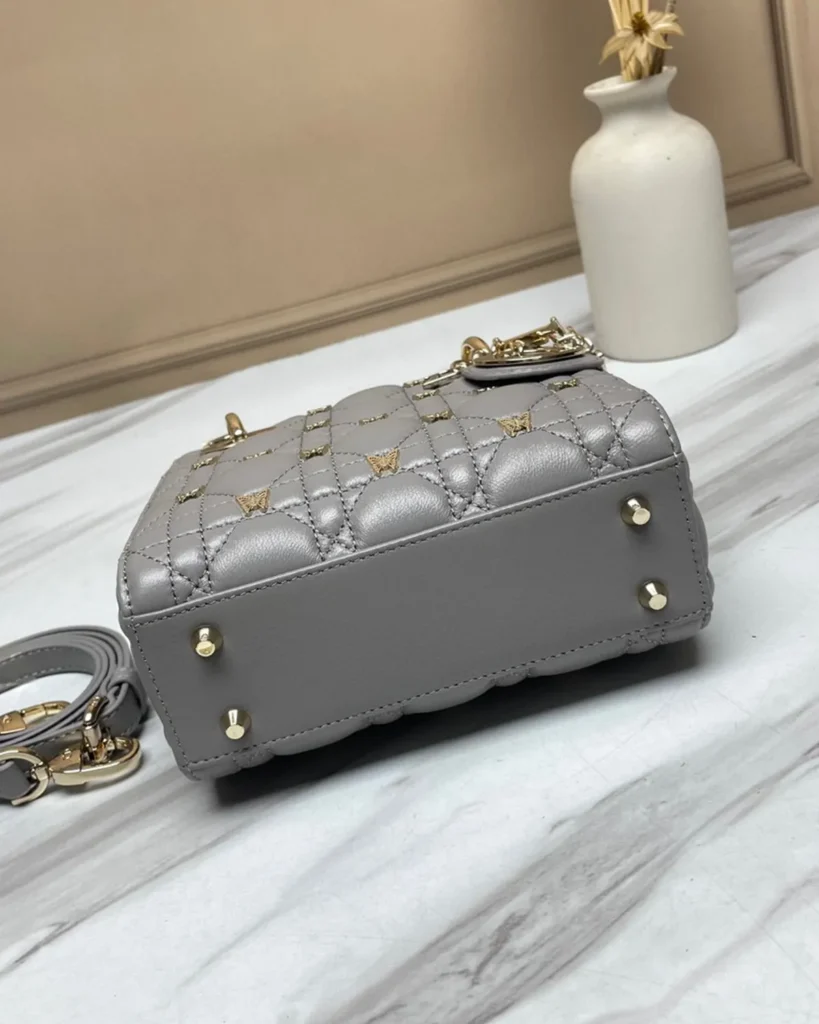 Gray Butterfly Stud Quilted Top Handle Bag — base view