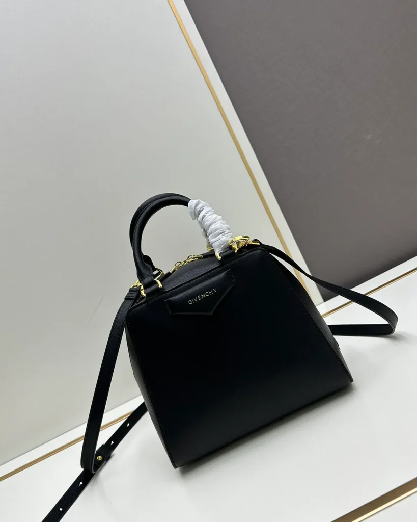 Black Domed Top Handle Bag — front with strap view