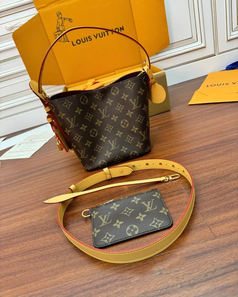 Brown Monogram Curved Top Bucket Bag — bag and pouch view