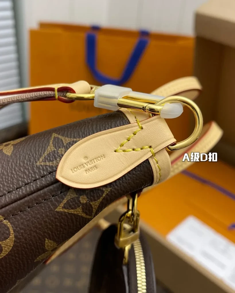 Brown Monogram Mini Tote with Round Pouch — strap clip view