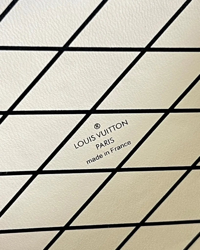 Brown Monogram Black-Trim Trunk Bag — interior detail view