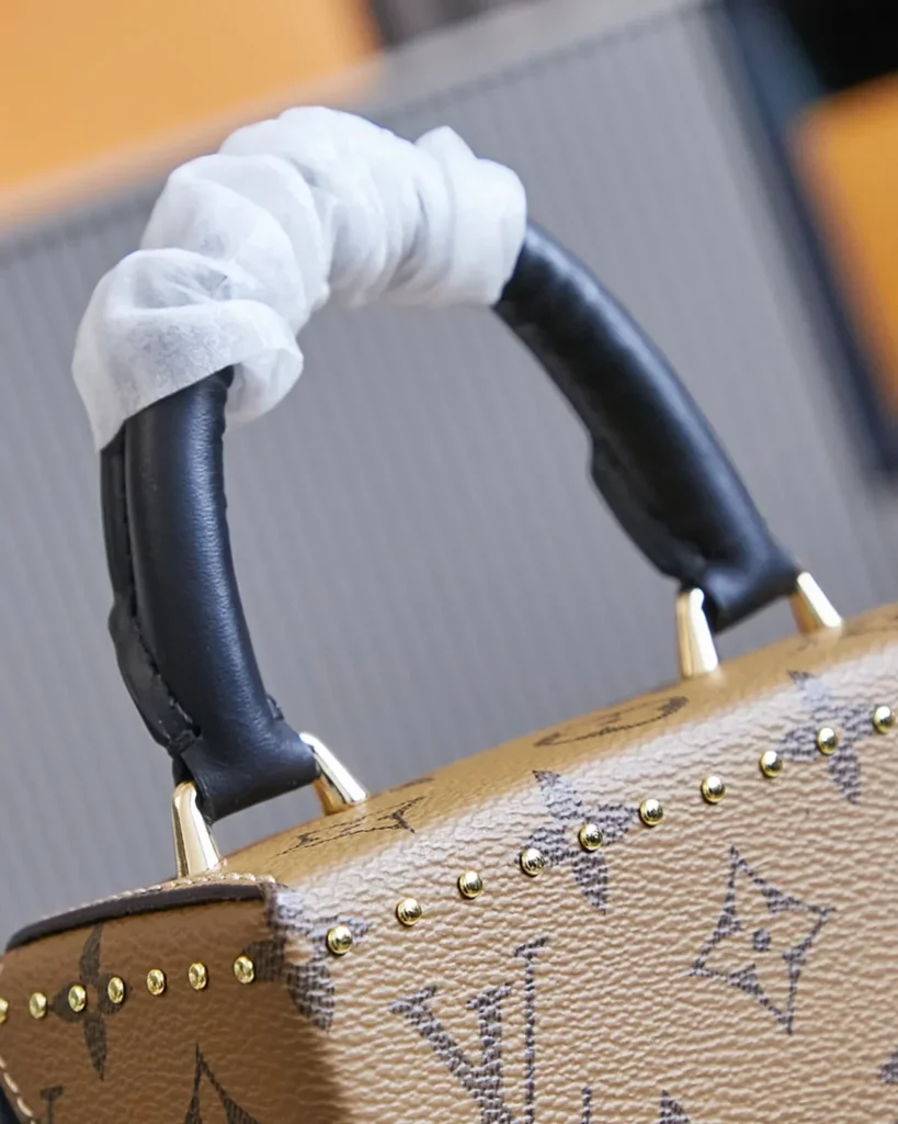 Two-Tone Monogram Vertical Box Bag — handle view
