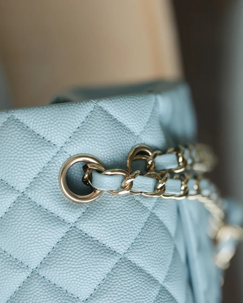 Pale Blue Quilted Gold-Tone Chain Flap Bag — strap detail view