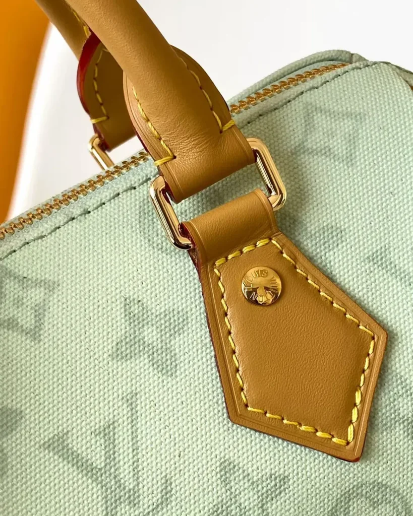 Pale Green Monogram Boston Bag — handle tab view