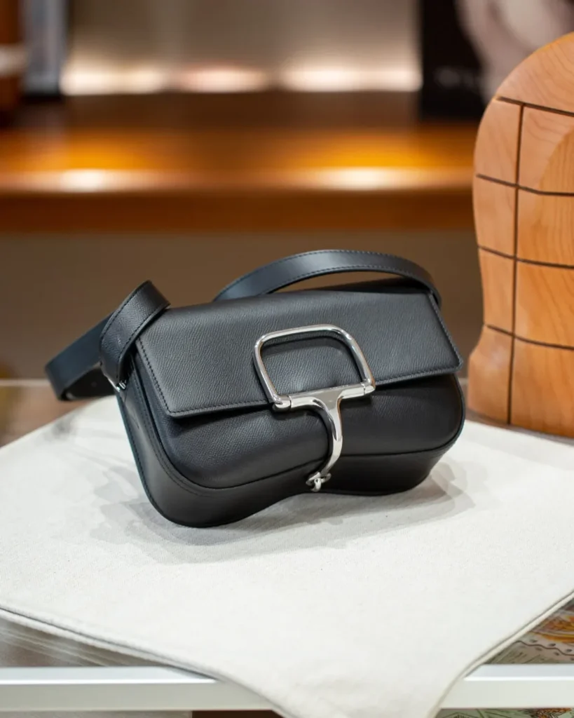 Della Cavalleria-Inspired Black Elan Saddle Bag, tilted front view
