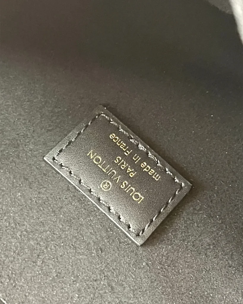 Two-Tone Monogram Envelope Satchel — interior label view