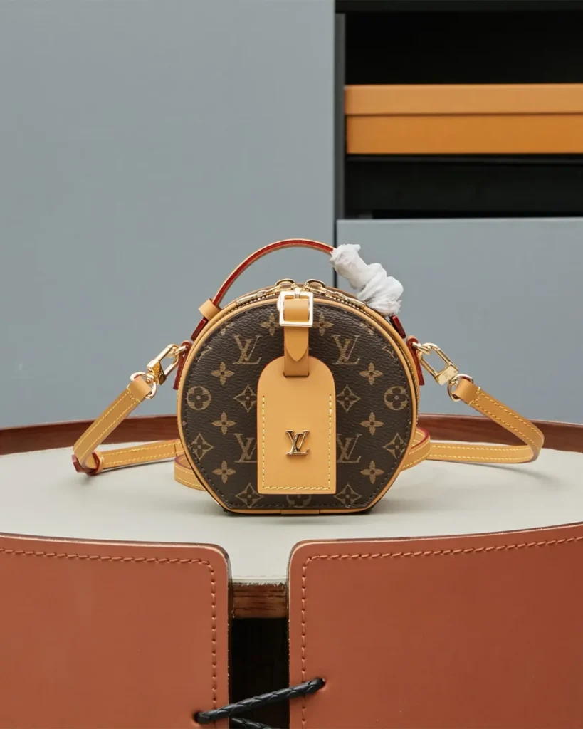 Brown Monogram Round Crossbody Bag — front view