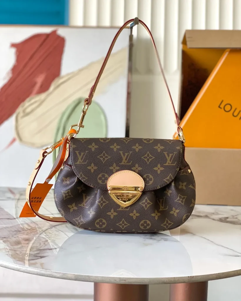 Brown Monogram Curved Flap Shoulder Bag — front view
