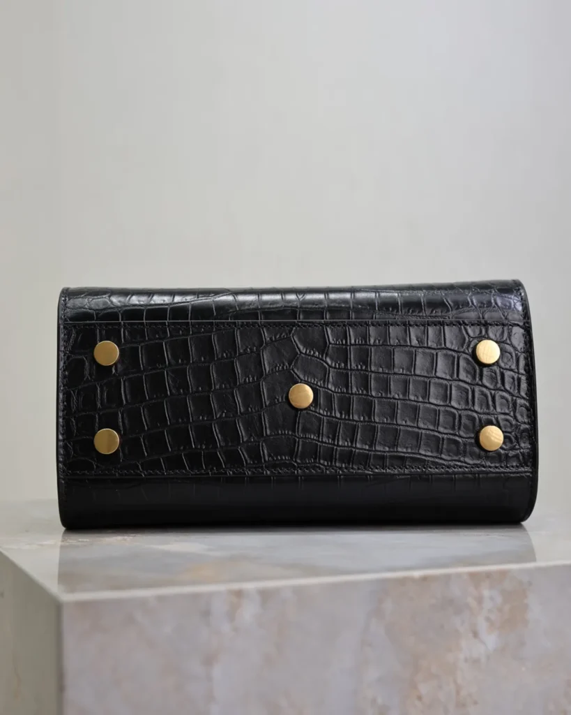 Black Embossed Accordion Tote — base view