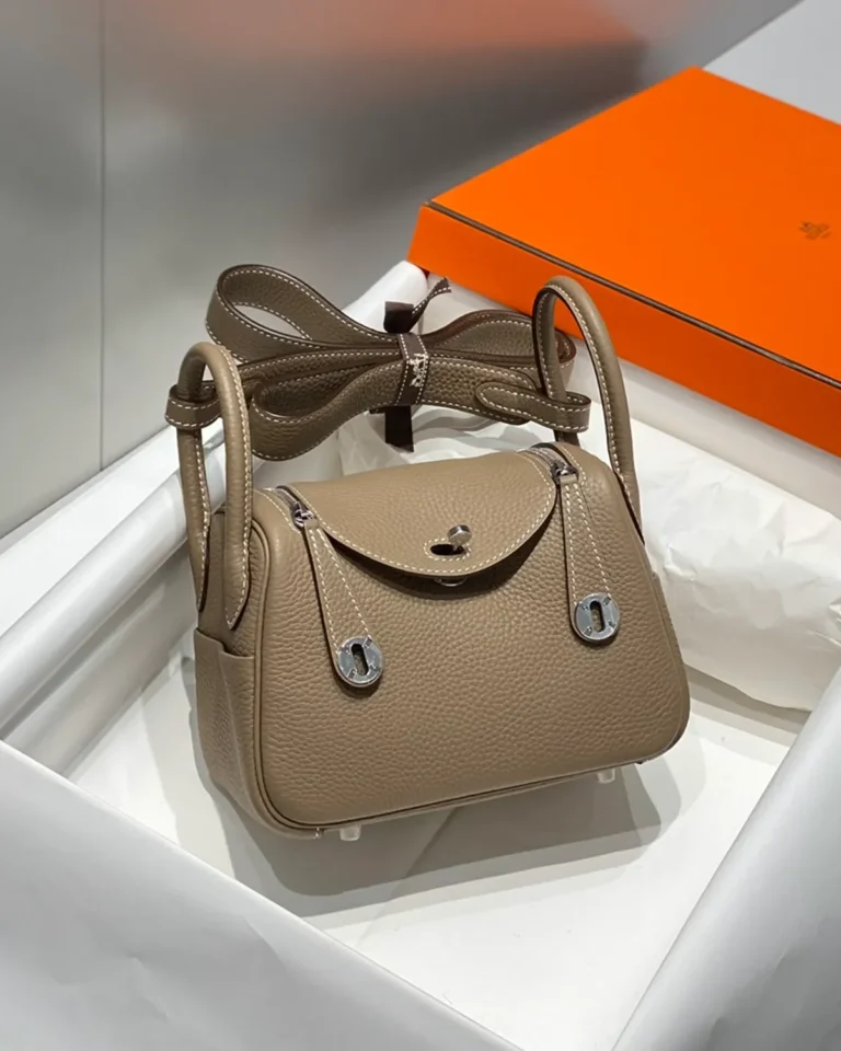 Lindy-Inspired Mini Taupe Crossbody Bag, front with folded strap