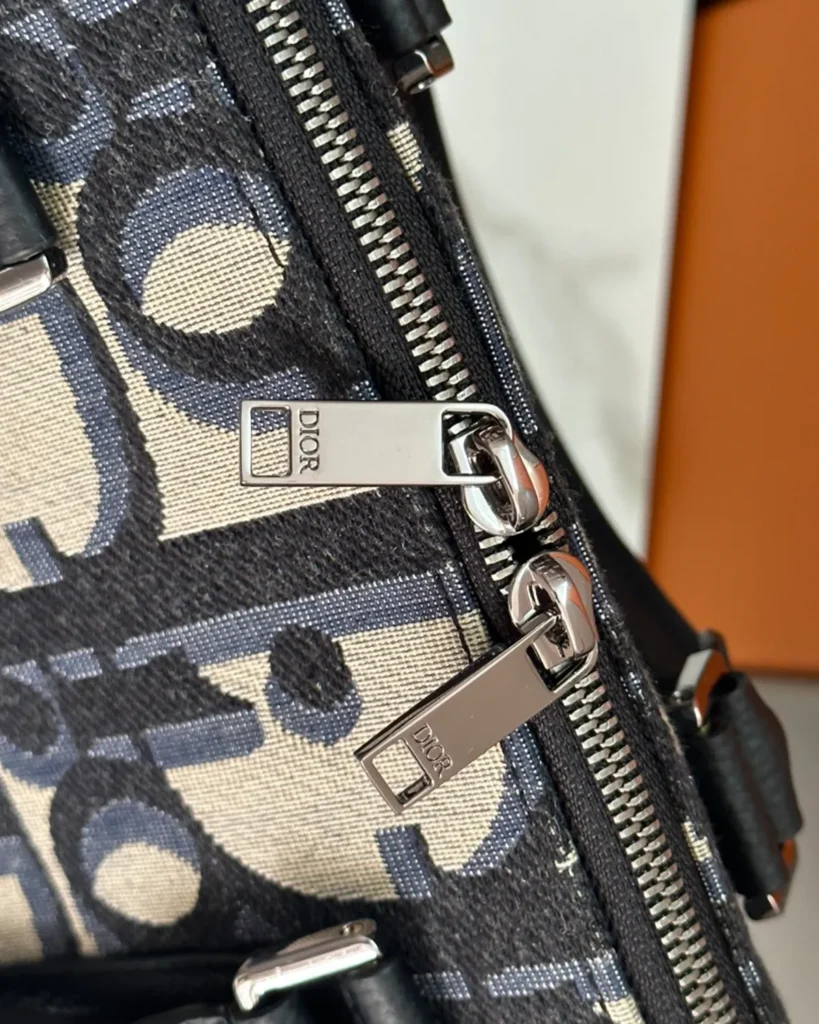 Beige Navy Monogram Zip Travel Tote — zipper detail view