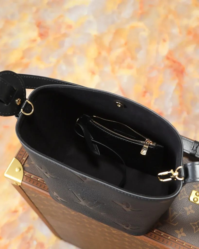 Black Embossed Monogram Bucket Bag — interior view