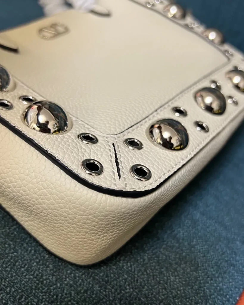 Cream Studded Long-Handle Tote — stud detail view