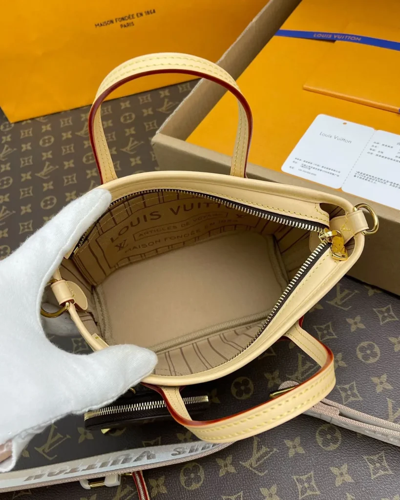 Brown Monogram Mini Tote with Round Pouch — interior view