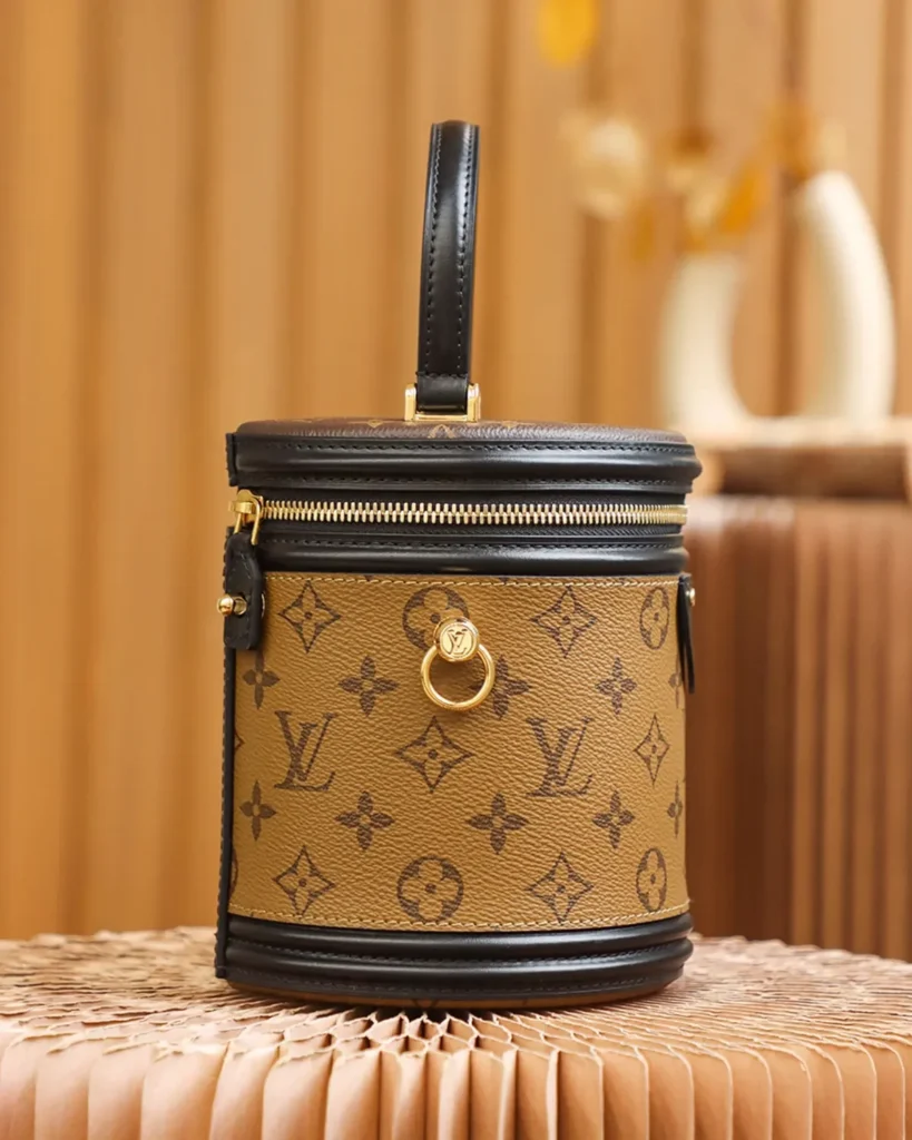Tan Monogram Cylindrical Vanity Bag — zipper detail view