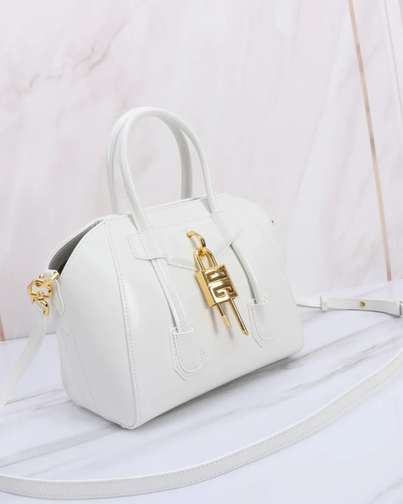 White Lock Detail Top Handle Bag — side angle view