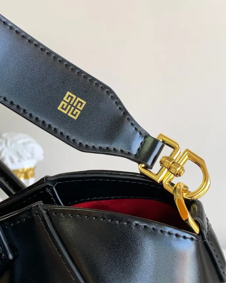 Black Red-Lined Twin-Handle Satchel — strap hardware